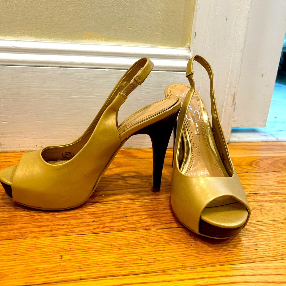 Jessica Simpson high heals with peak a boo toe, elegant and sexy yet classy .